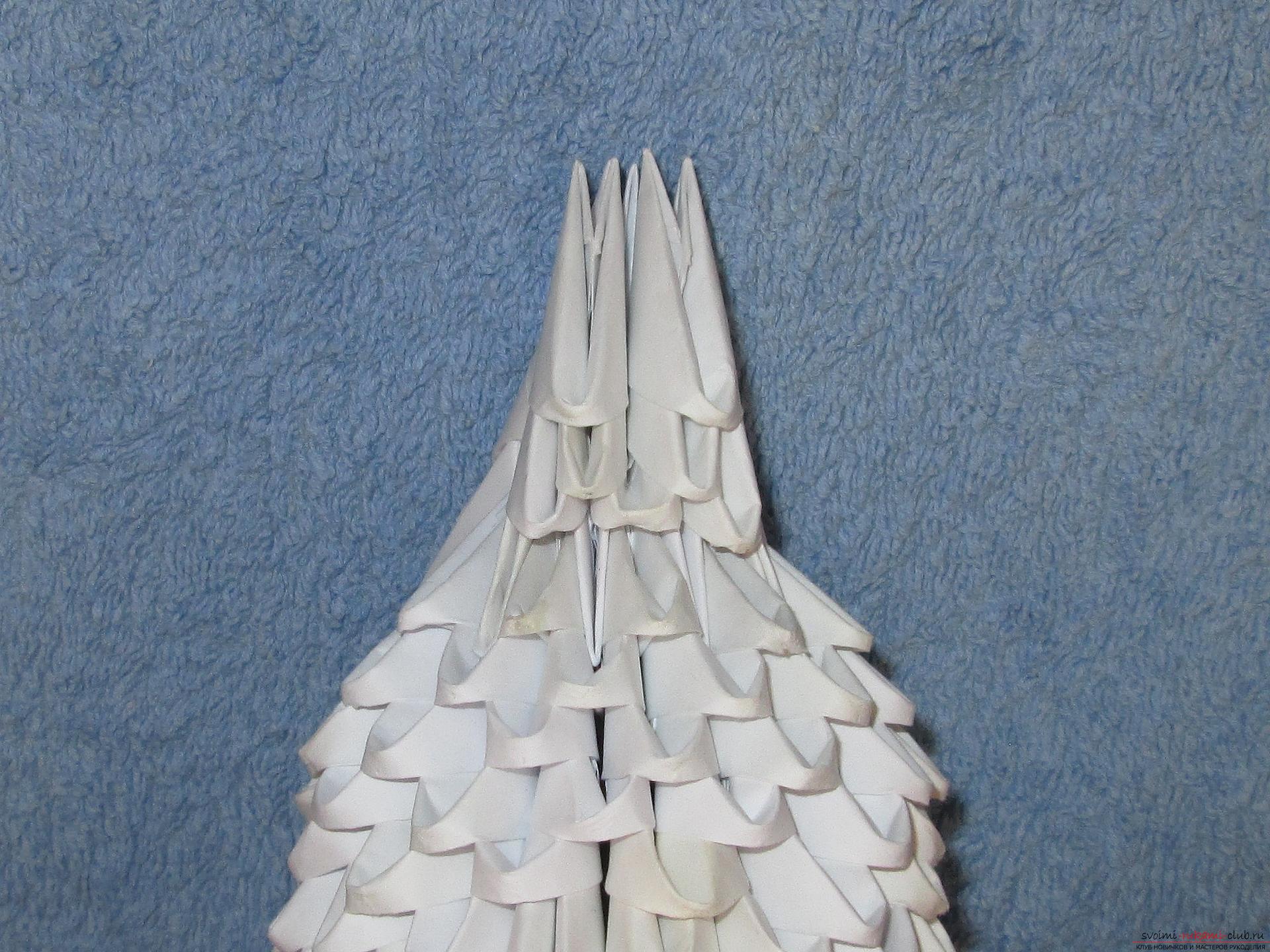 Если вы любите собирать модульное оригами, этот мастер-класс по созданию дельфина из бумаги для вас.. Фото №23